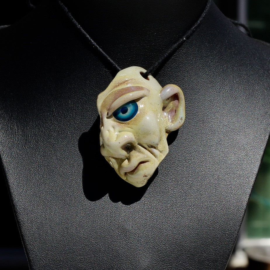 Half Face Pendant 