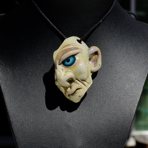 Half Face Pendant 
